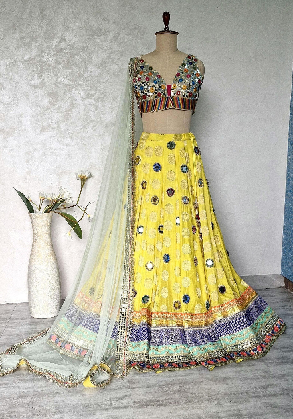 Yellow Brocade Silk Lehenga Choli with Mirror Work DVMTD_0257