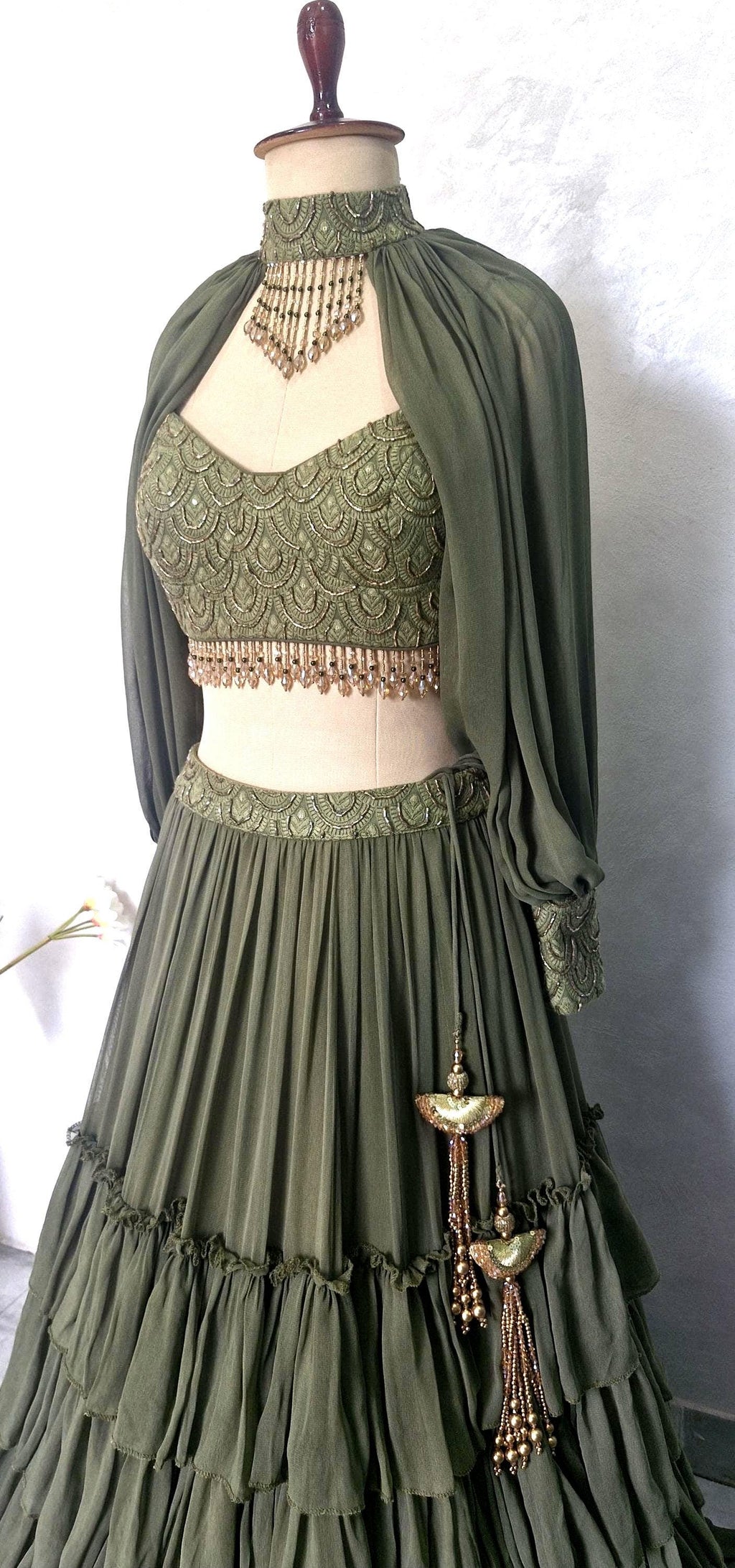 Olive Green Georgette Tiered Lehenga Choli. Embroidered Blouse, Bishop Sleeves. Mehendi Outfit DVMTD_0298