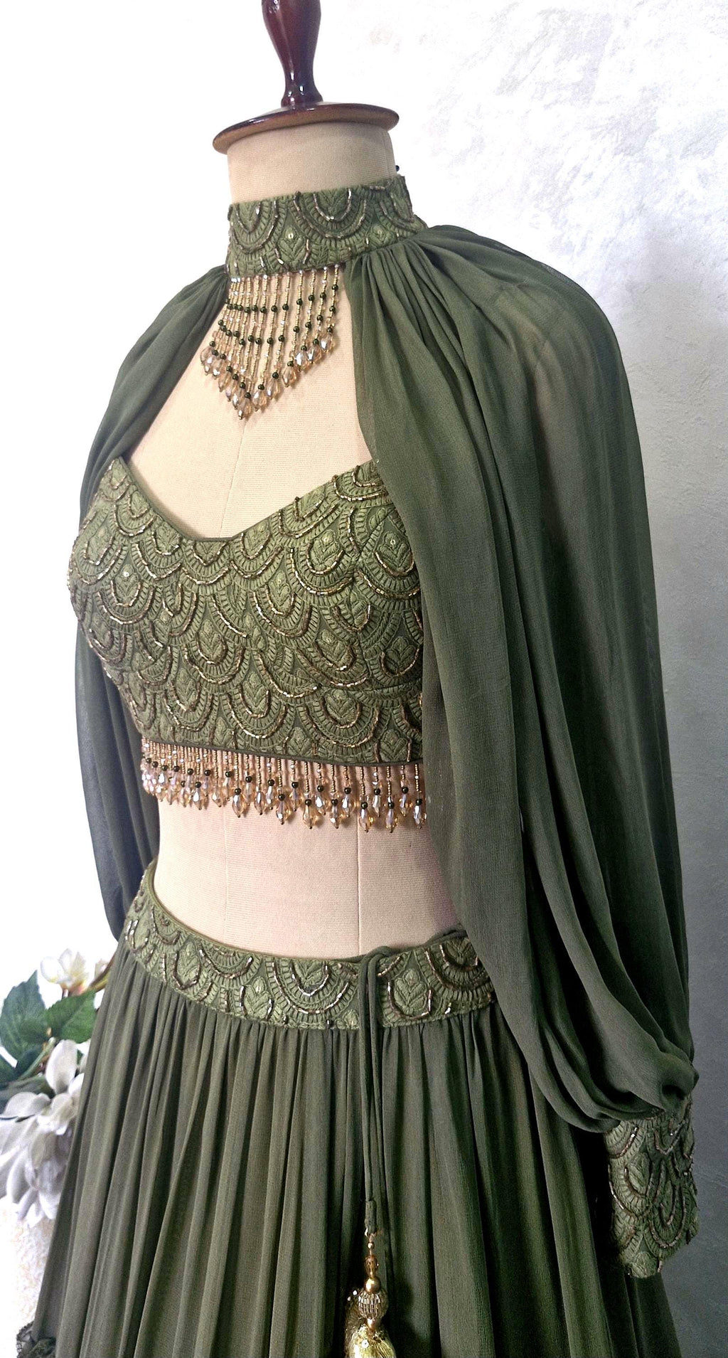 Olive Green Georgette Tiered Lehenga Choli. Embroidered Blouse, Bishop Sleeves. Mehendi Outfit DVMTD_0298