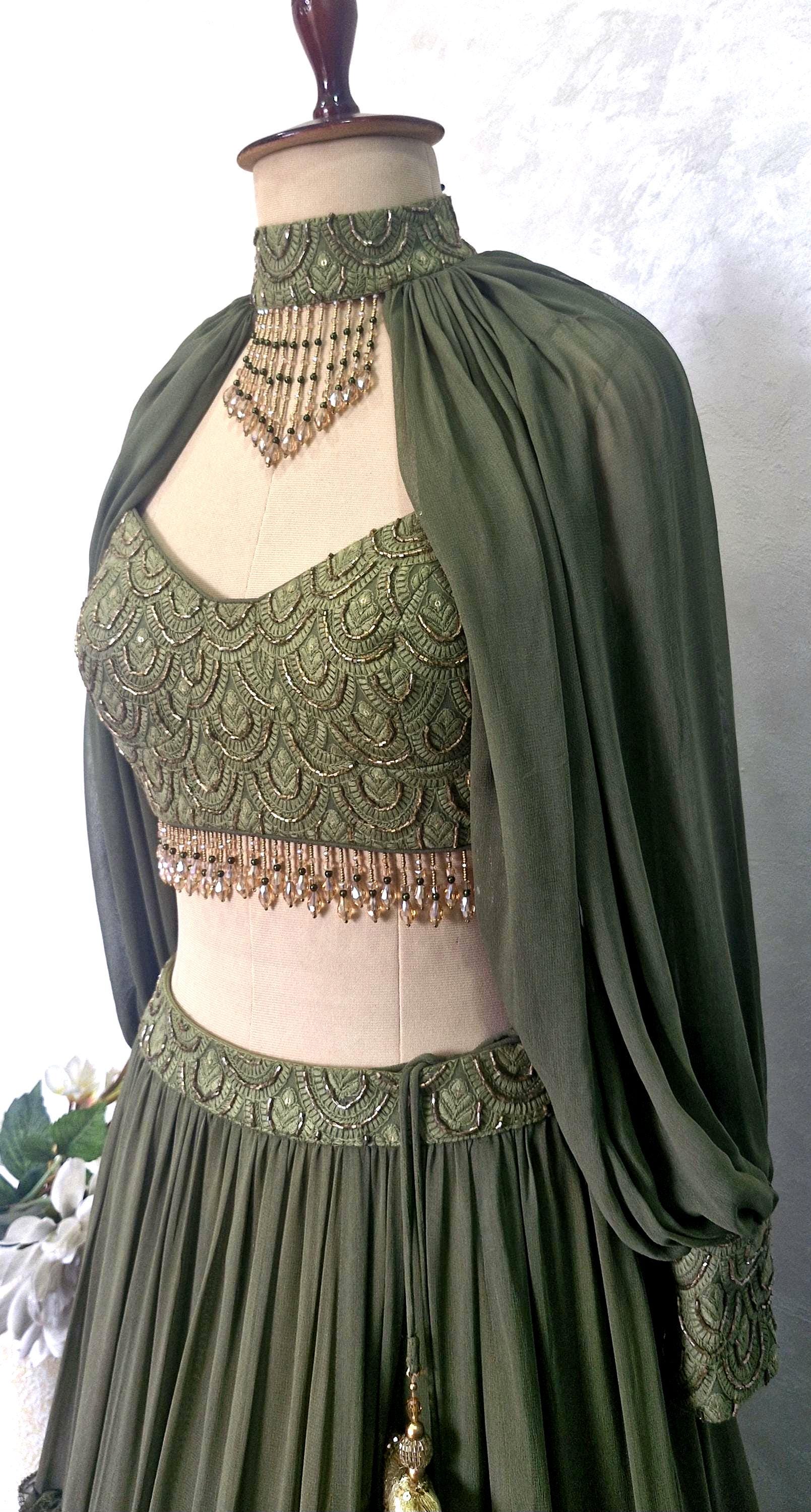 Olive Green Georgette Tiered Lehenga Choli. Embroidered Blouse, Bishop Sleeves. Mehendi Outfit DVMTD_0298